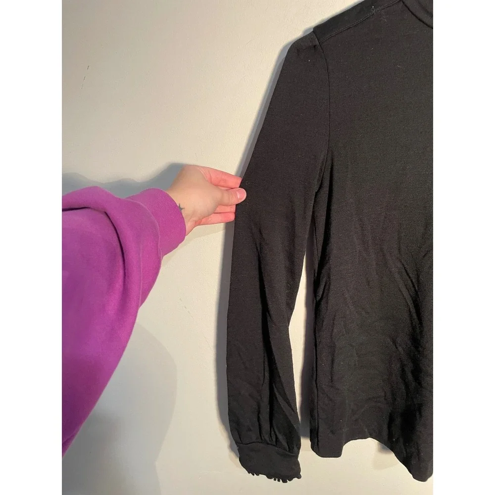 Diane von Furstenberg Black Wool Turtleneck‎ Ruffle Hem Top Size 10 Quiet Luxury